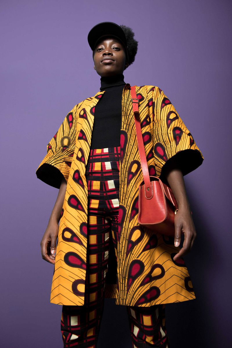 Model wears a coat by fashion agency Hanimanns Hanimanns, a fashion agency for African designers